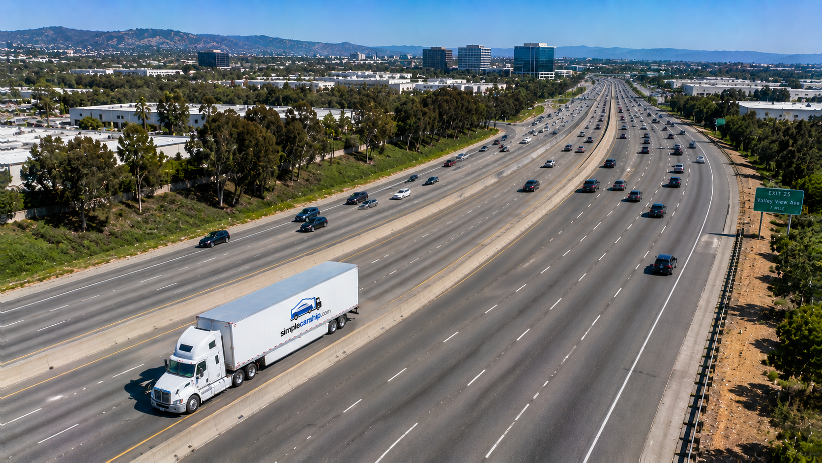 Aerial view of an open auto-transport carrier on the interstate shipping a car from Minnesota to New York